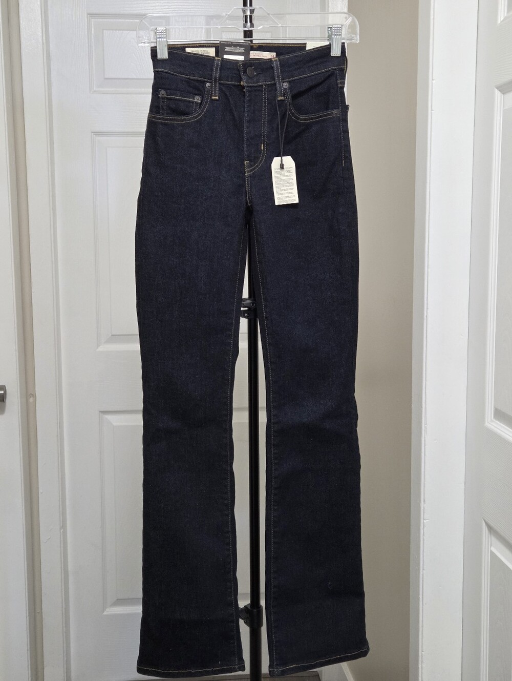 Levi's 725 High-Rise Bootcut Jeans in Dark Indigo with Tan Leather Patch